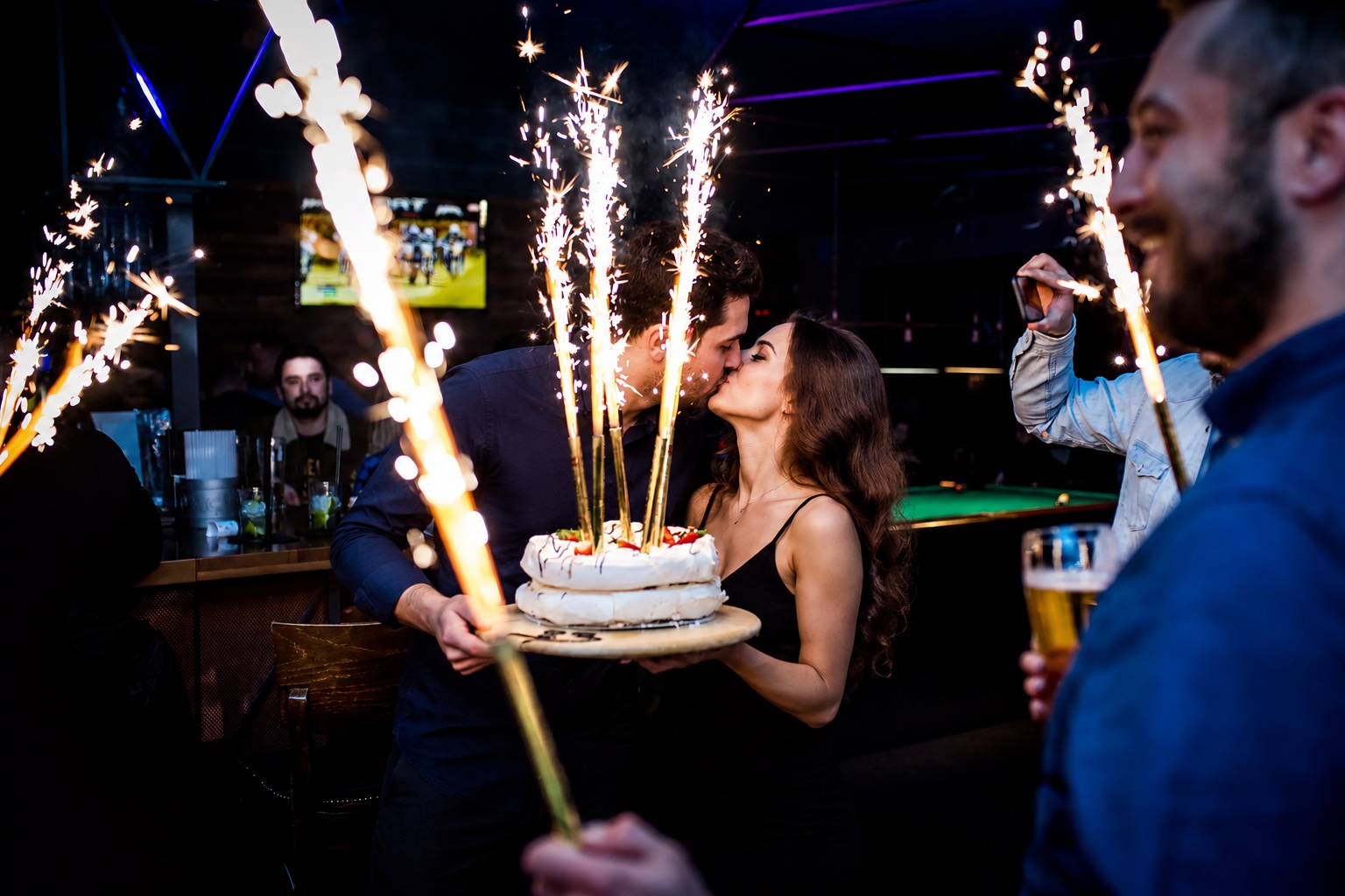 A birthday party with cake and sparklers at Klub Pictures